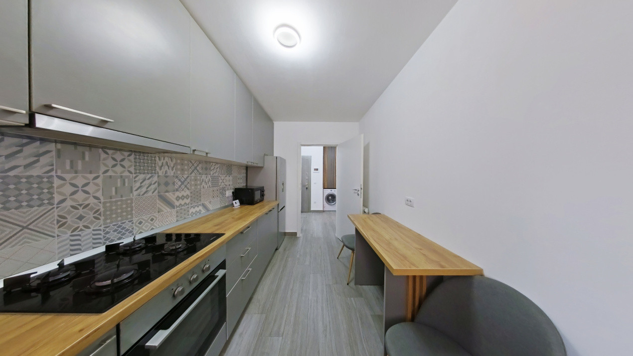 Apartament 2 camere, decomandat,  loc parcare - Tractorul 
