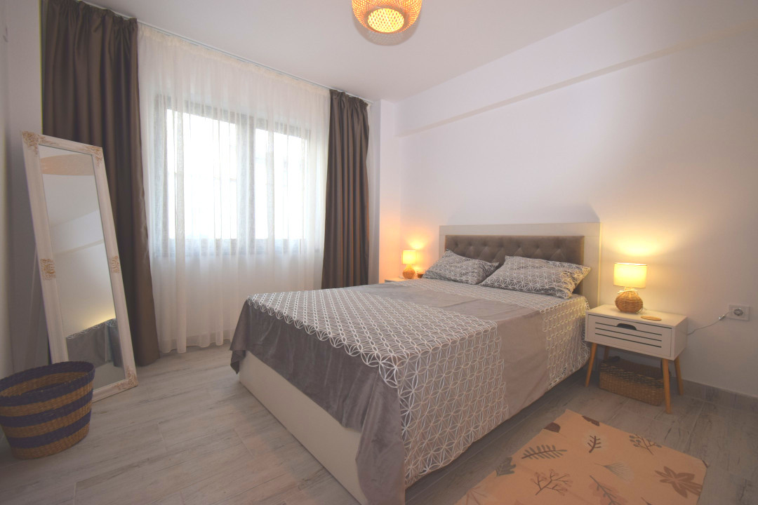 Apartament decomandat, bloc nou, loc de parcare, complet mobilat 