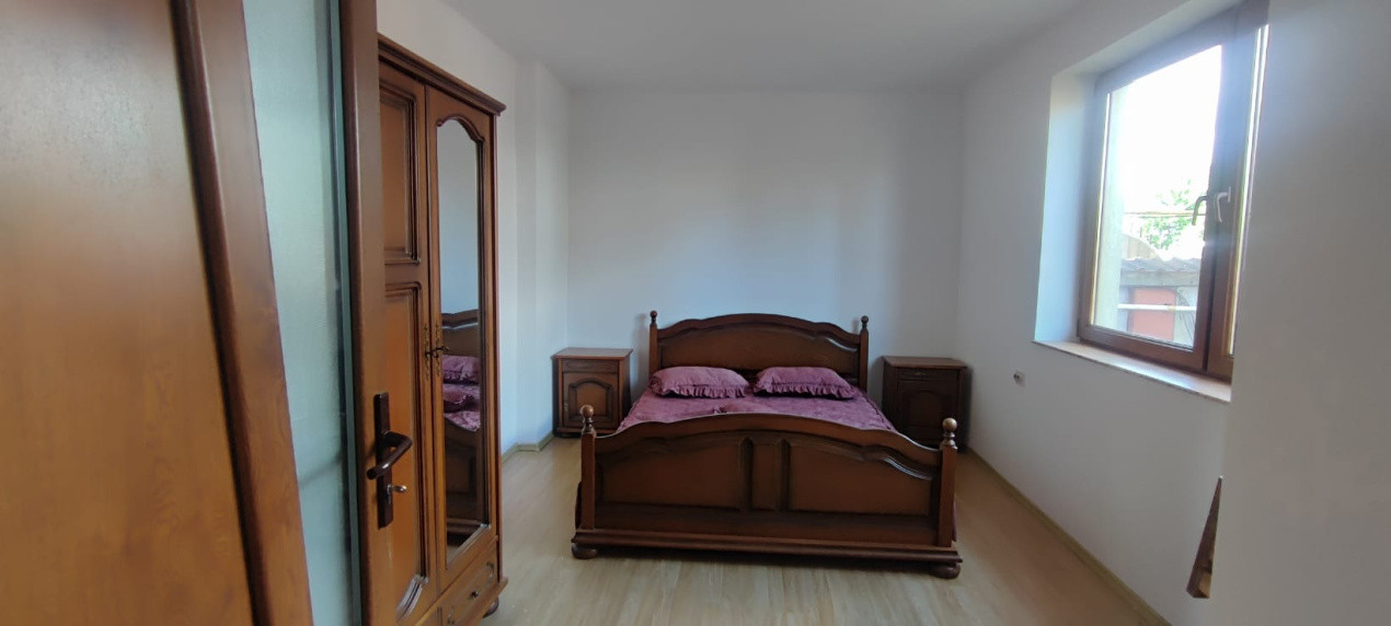Casă de închiriat – 2 dormitoare, 100 mp utili + curte 220 mp, garaj, filigorie