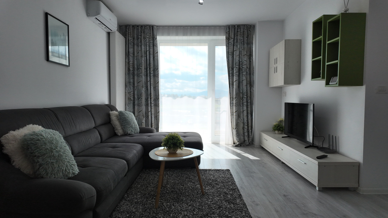 Închiriere apartament cu 2 camere, modern și complet mobilat, în zona Tractorul