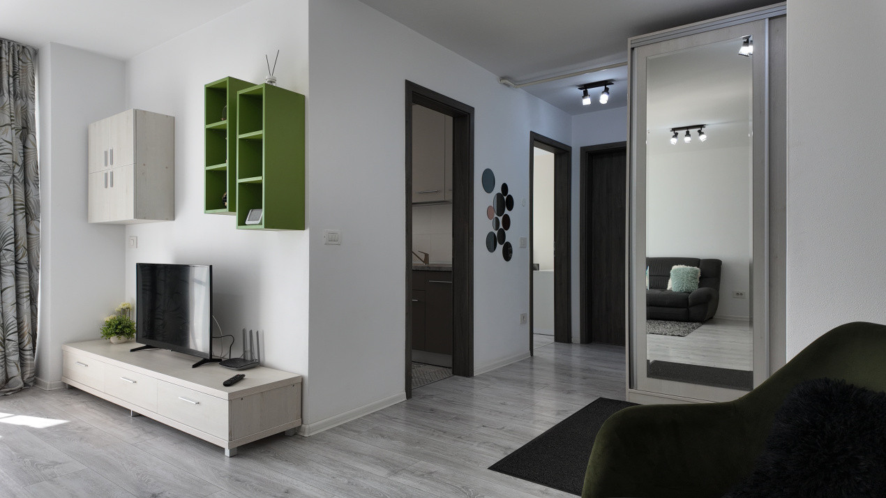 Închiriere apartament cu 2 camere, modern și complet mobilat, în zona Tractorul