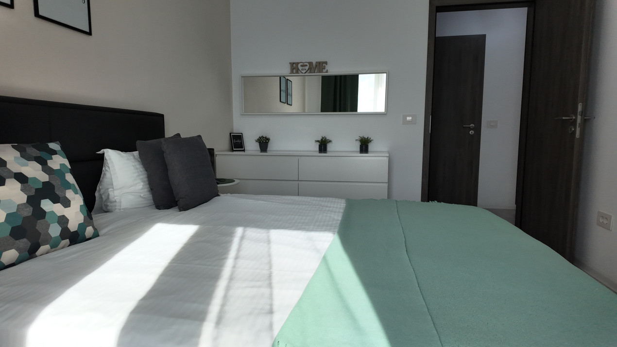 Închiriere apartament cu 2 camere, modern și complet mobilat, în zona Tractorul