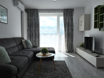 Închiriere apartament cu 2 camere, modern și complet mobilat, în zona Tractorul