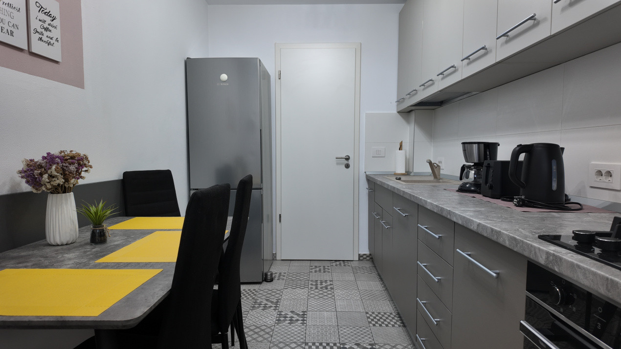 Apartament cu 2 camere, modern și complet mobilat, în zona Tractorul