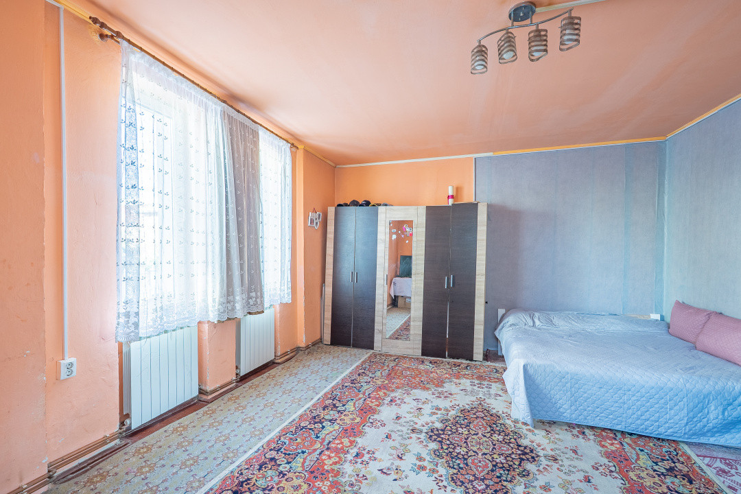 Casă individuală compusă din două apartamente, cu teren liber de 540 mp 