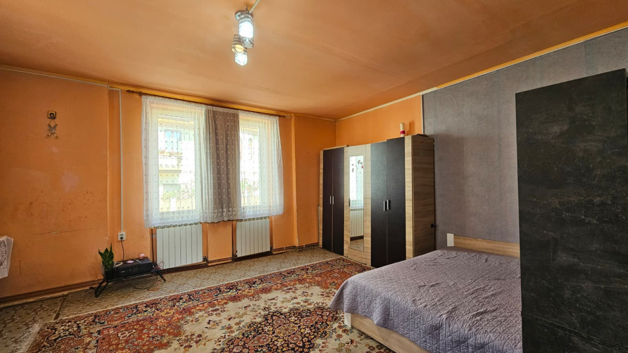 Casă individuală compusă din două apartamente, cu teren liber de 540 mp 