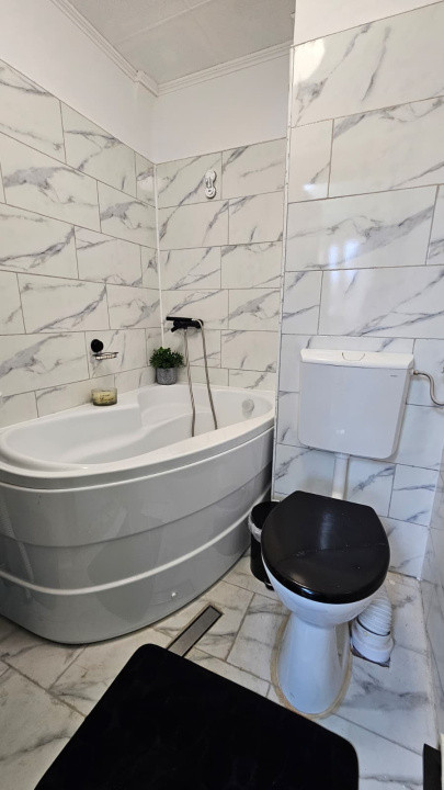 Casă individuală compusă din două apartamente, cu teren liber de 540 mp 