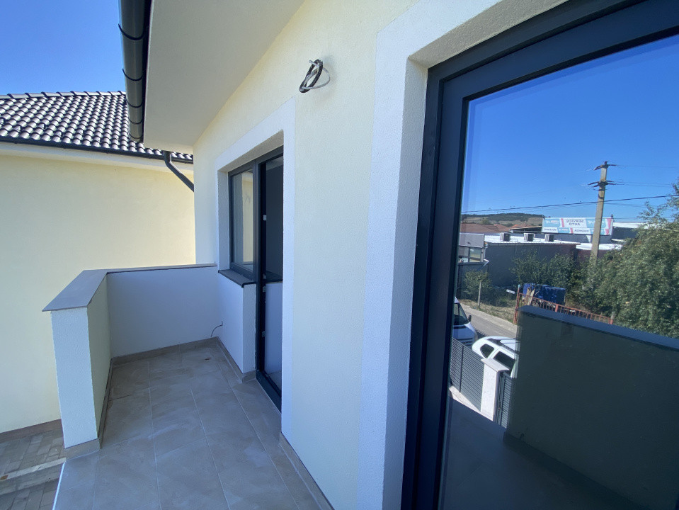 Casa individuala 4 camere 2 bai teren de 200mp liber Sibiu Cristian 