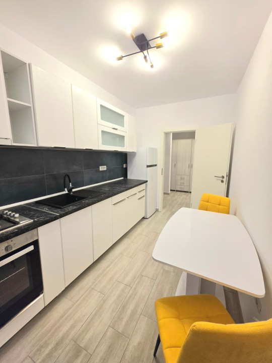  Garsoniera de inchiriat + loc de parcare 