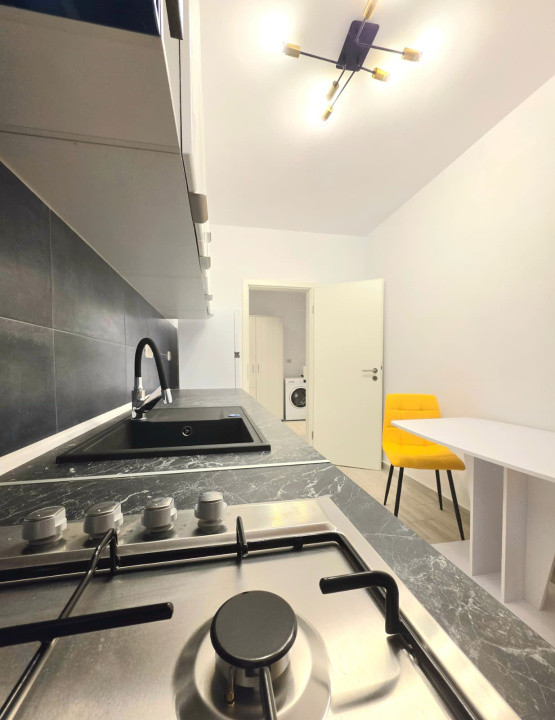  Garsoniera de inchiriat + loc de parcare 