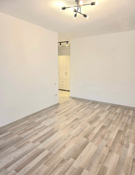  Garsoniera de inchiriat + loc de parcare 