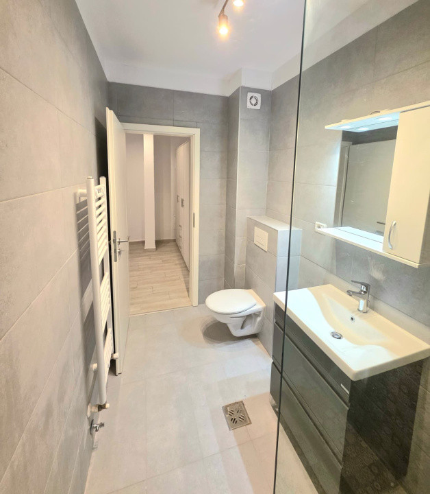  Garsoniera de inchiriat + loc de parcare 