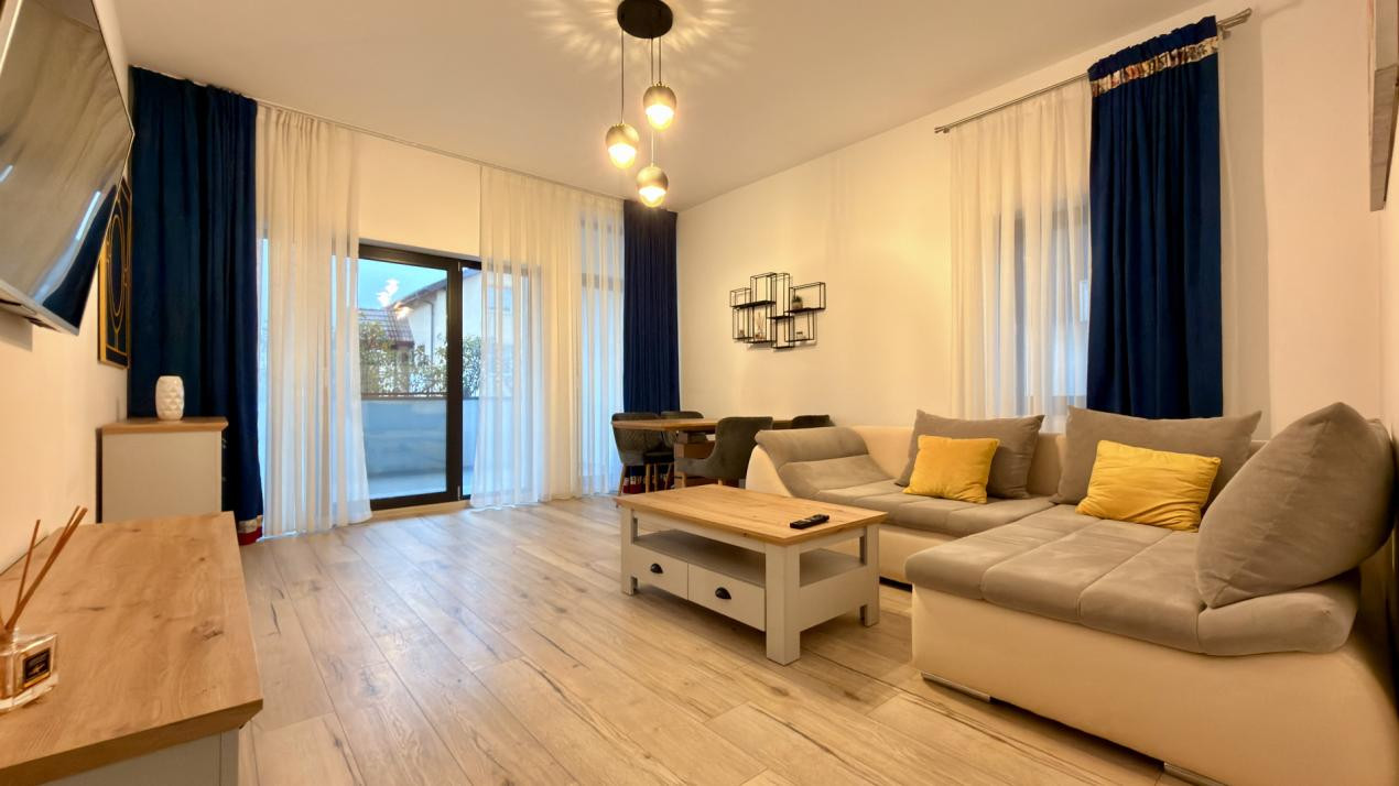 Apartament la parter cu curte privată, terase și două locuri de parcare