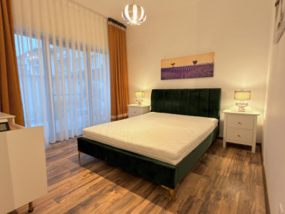 Apartament la parter cu curte privată, terase și două locuri de parcare