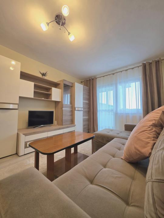 De închiriat 2 camere + loc de parcare