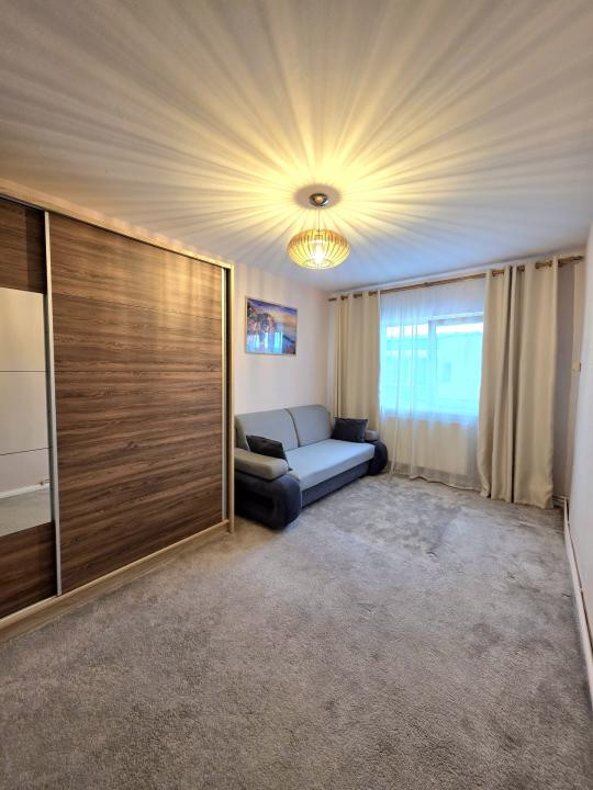 De închiriat 2 camere + loc de parcare