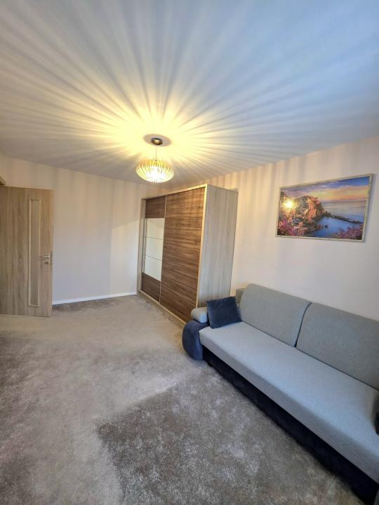 De închiriat 2 camere + loc de parcare