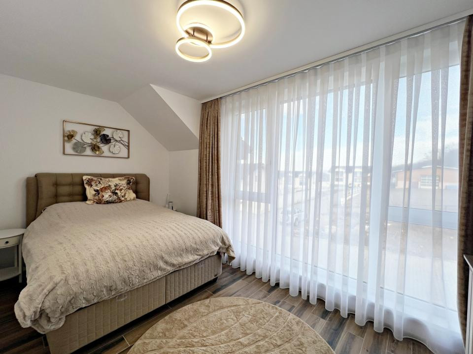 Casa nouă 4 cam. modernă, mobilată și utilată, curte. 10 min. de Sibiu 