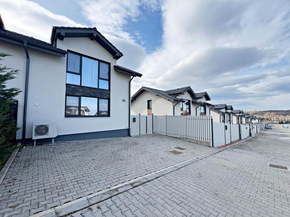 Casa nouă 4 cam. modernă, mobilată și utilată, curte. 10 min. de Sibiu 