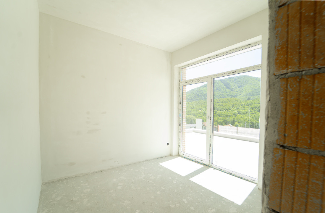 Casă arhitectură modernă cu panoramă spre Munții Făgăraș și Cetatea Cisnădioara 