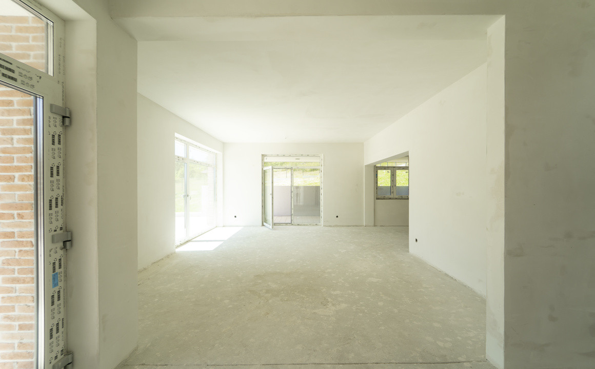 Casă arhitectură modernă cu panoramă spre Munții Făgăraș și Cetatea Cisnădioara 