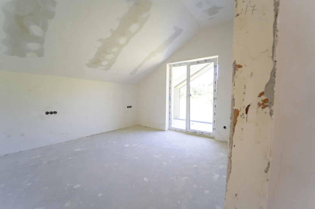 Casă arhitectură modernă cu panoramă spre Munții Făgăraș și Cetatea Cisnădioara 