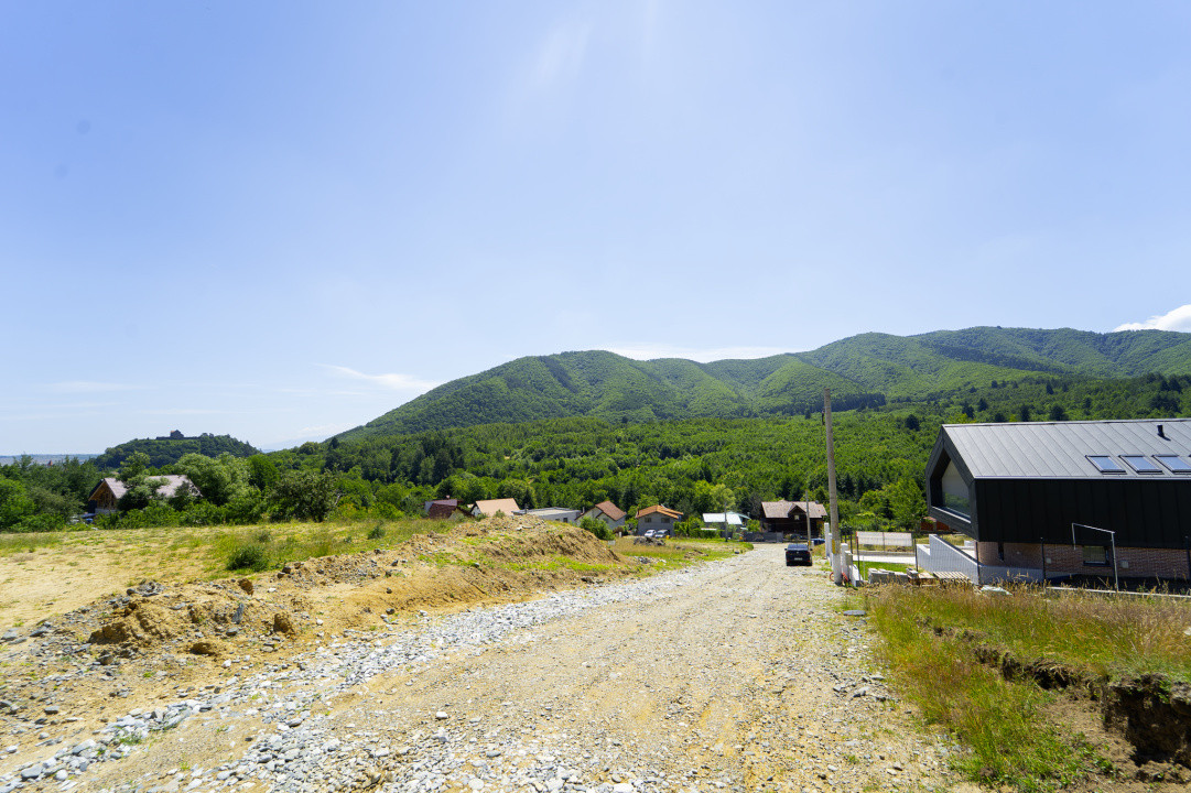 Casă arhitectură modernă cu panoramă spre Munții Făgăraș și Cetatea Cisnădioara 