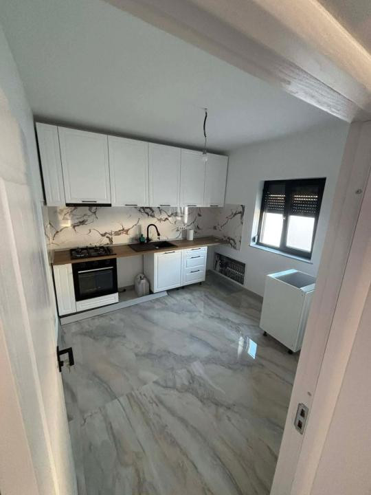  Casă practică și bine compartimentată, ideală pentru familie