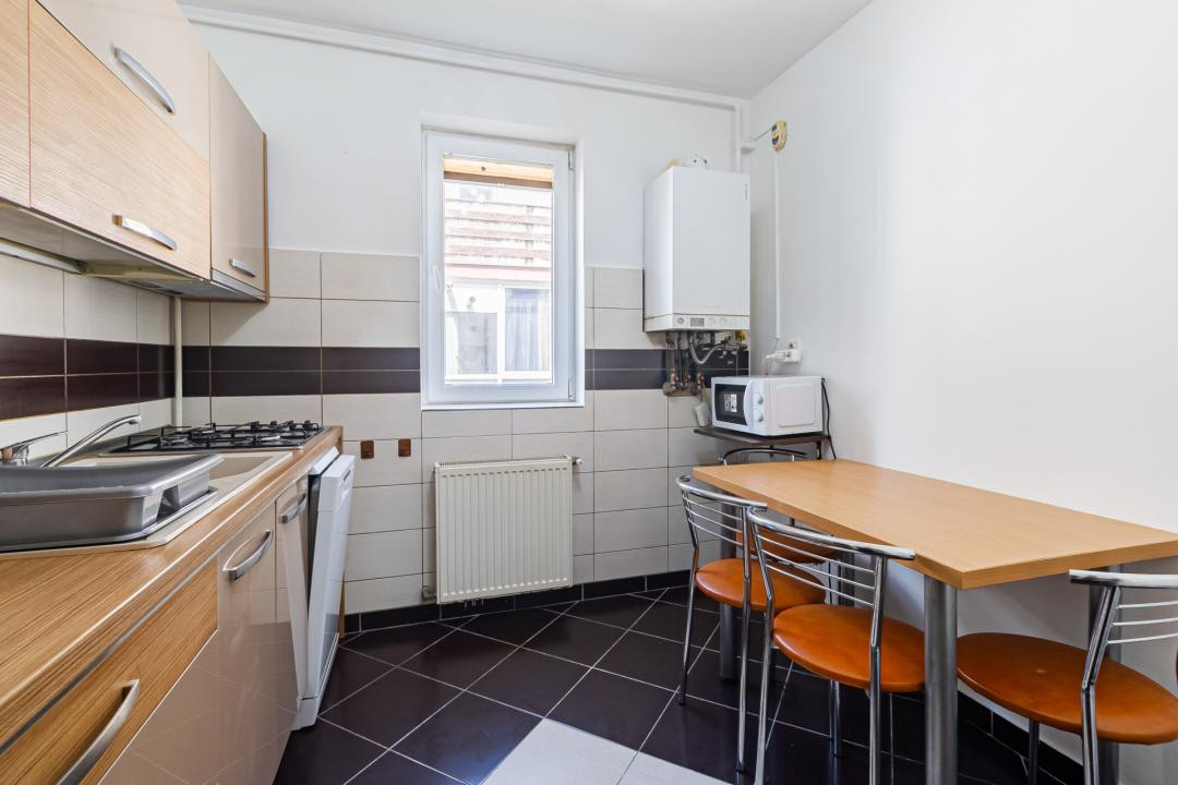 Apartament modern- 2 camere, etaj 1-decomandat, loc de parcare - Tractorul 