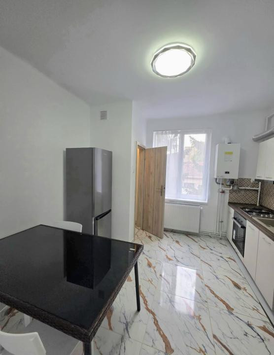 Apartament 2,5 camere decomandat + 2 locuri de parcare 