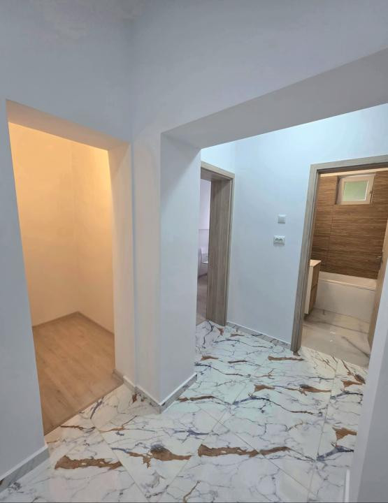 Apartament 2,5 camere decomandat + 2 locuri de parcare 