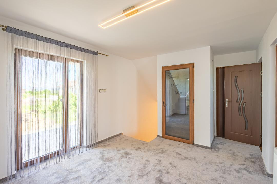 Casă individuală în Veterani, curte liberă 400 mp, zonă foarte căutată!