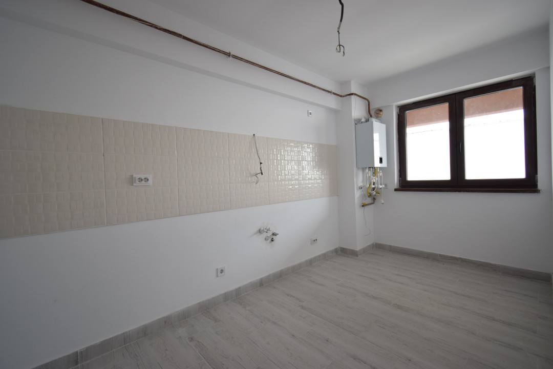 Apartament bloc nou, parter, 2 camere, incalzire in pardoseala, loc de parcare