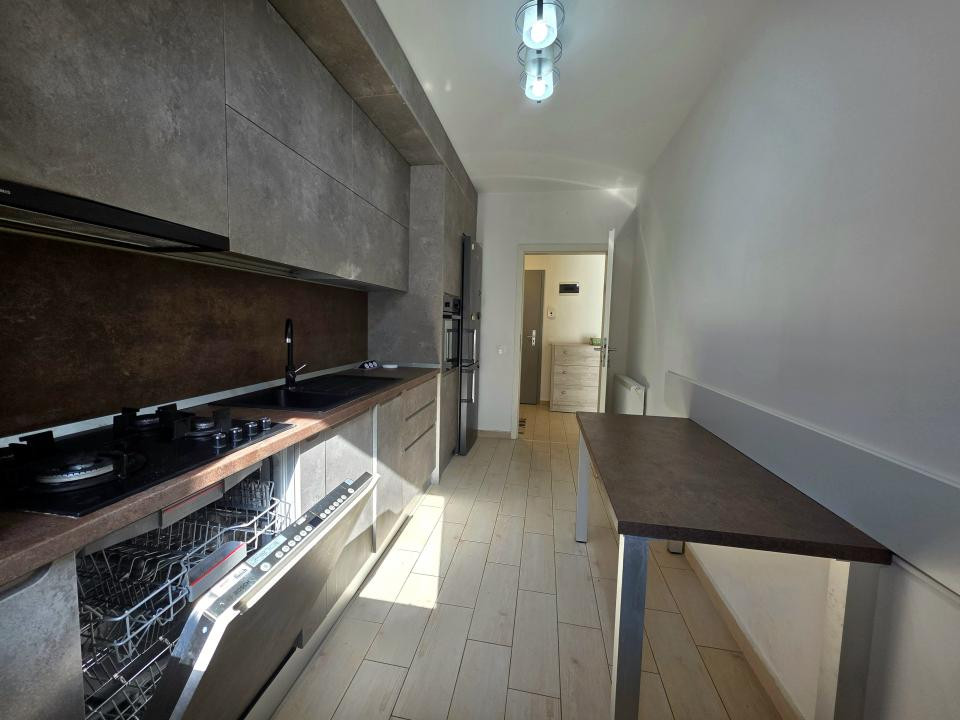 Apartament cu 2 camere cu boxa + loc de parcare 