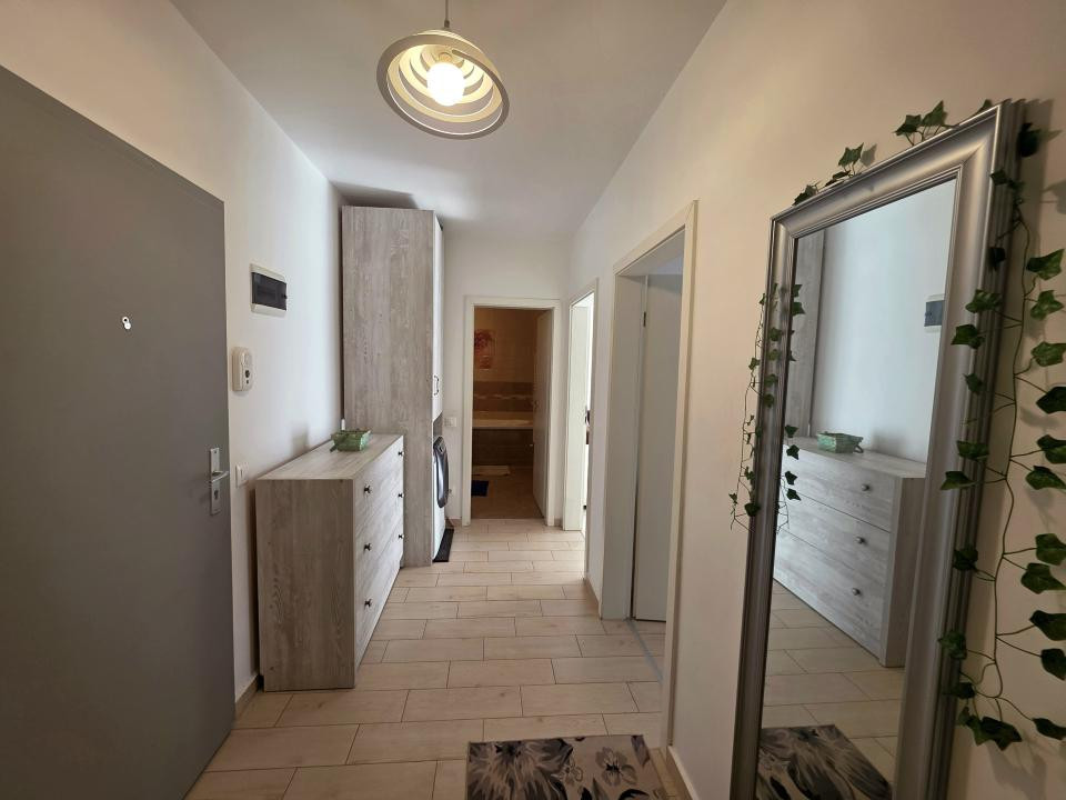 Apartament cu 2 camere cu boxa + loc de parcare 