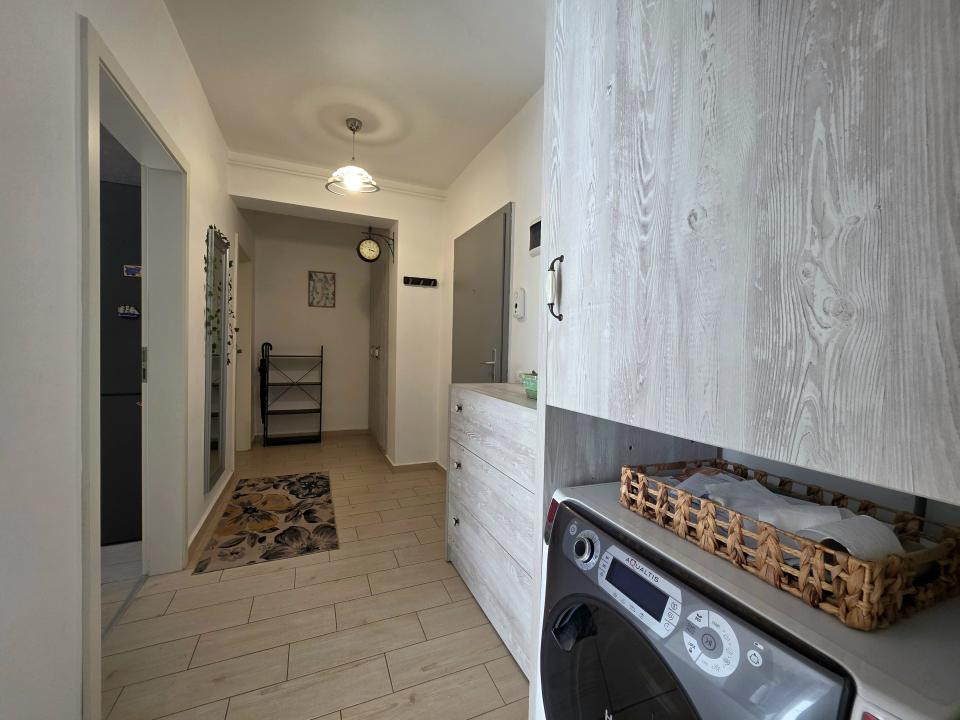 Apartament cu 2 camere cu boxa + loc de parcare 