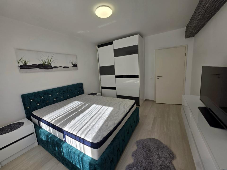 Apartament cu 2 camere cu boxa + loc de parcare 