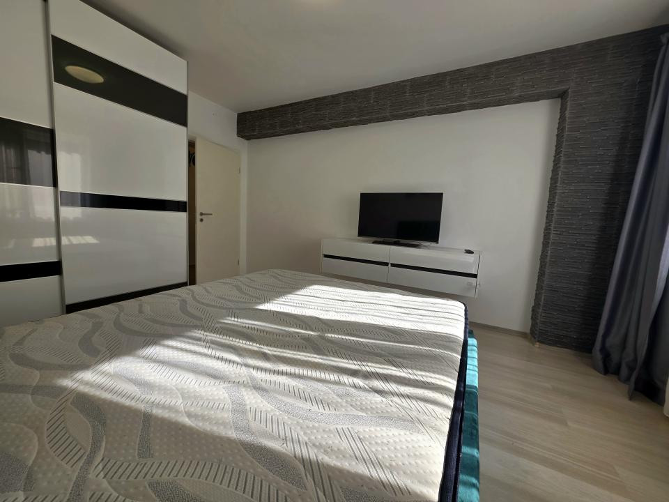 Apartament cu 2 camere cu boxa + loc de parcare 