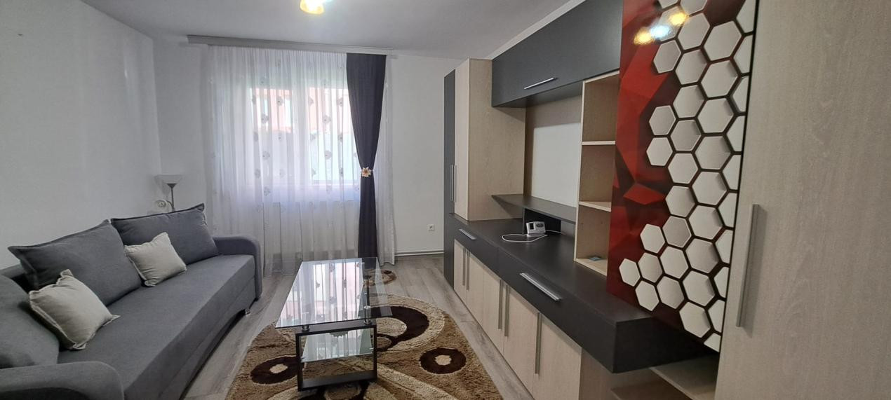 Apartament modern cu 2 camere, curte privată și 2 locuri de parcare