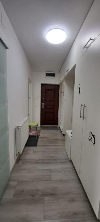 Apartament modern cu 2 camere, curte privată și 2 locuri de parcare
