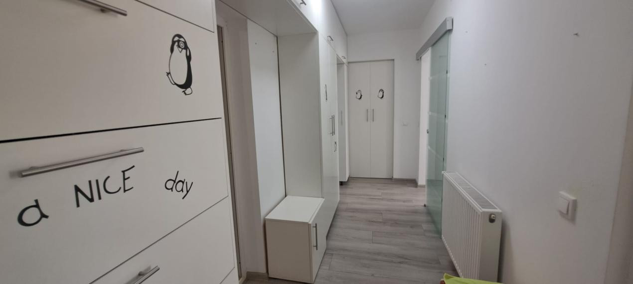 Apartament modern cu 2 camere, curte privată și 2 locuri de parcare