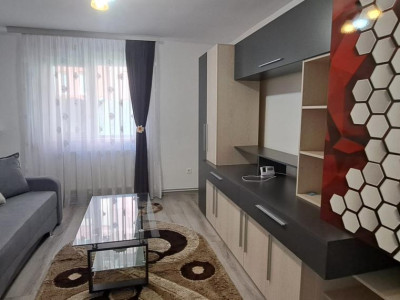 Apartament modern cu 2 camere, curte privată și 2 locuri de parcare