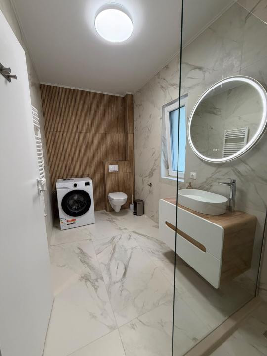 Apartament modern de 63 mp, cu 2 dormitoare și loc de parcare