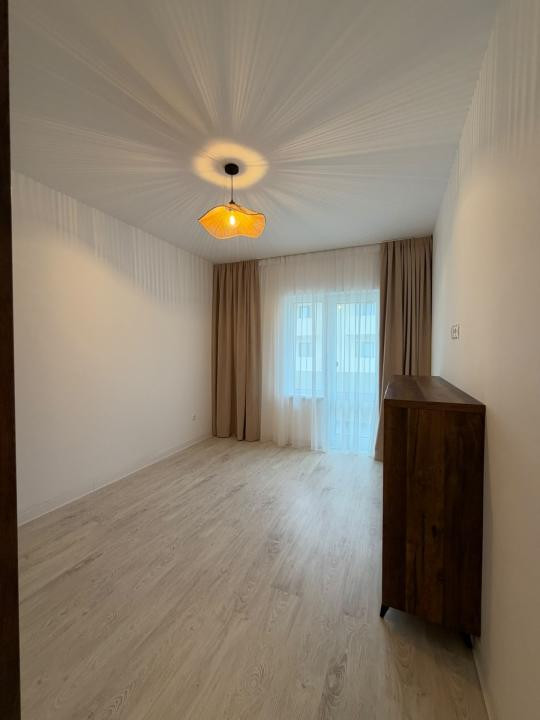 Apartament modern de 63 mp, cu 2 dormitoare și loc de parcare