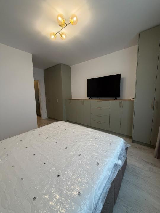 Apartament modern de 63 mp, cu 2 dormitoare și loc de parcare