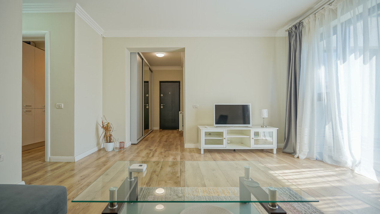 Apartament cu 2 camere, modern și complet mobilat, în zona Tractorul